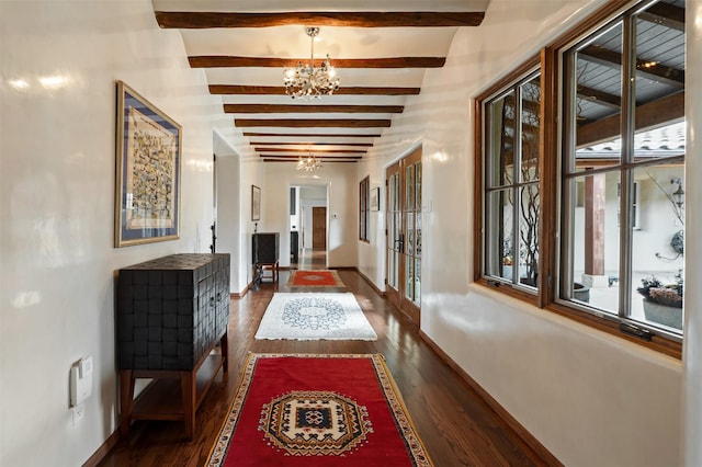 113 Circle Dr, Santa Fe, NM 87501 - corridor with a chandelier, beam ceiling, dark wood finished floors, french doors, and baseboards