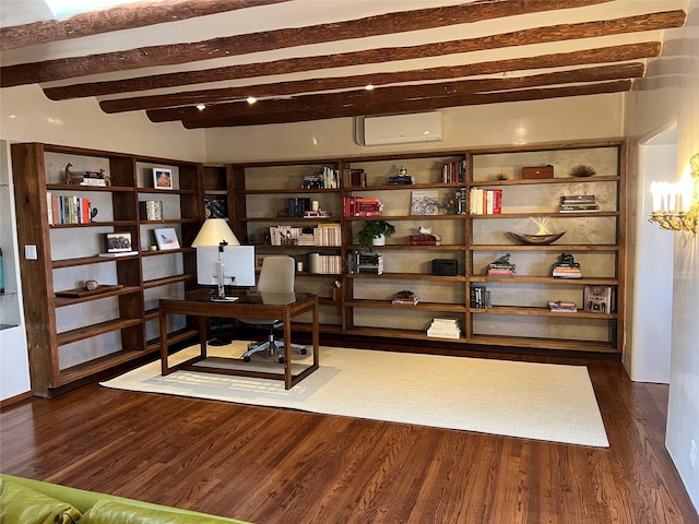 home office with a wall unit AC and dark wood-type flooring
