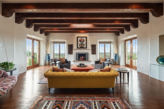 113 Circle Dr, Santa Fe, NM 87501 - living room with french doors, healthy amount of natural light, a fireplace, and beamed ceiling