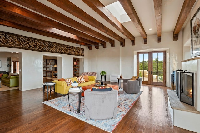 113 Circle Dr, Santa Fe, NM 87501 - living room featuring beam ceiling, a premium fireplace, wood finished floors, and french doors