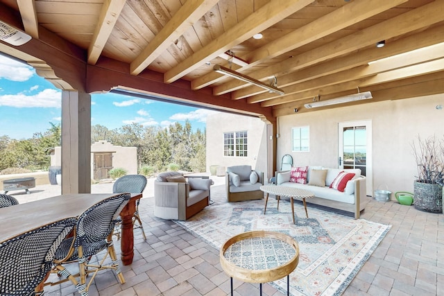 view of patio / terrace with an outdoor living space and outdoor dining area