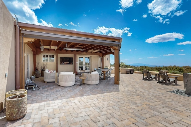 view of patio featuring french doors and outdoor dining space