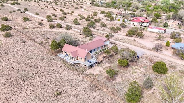 birds eye view of property with a desert view and a rural view