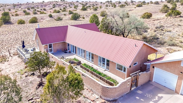 aerial view with a rural view, a mountain view, and a desert view