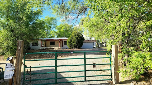 view of front of property featuring a gate and a fenced front yard