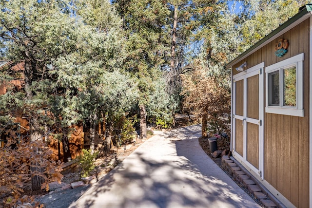 view of side of property featuring a patio area