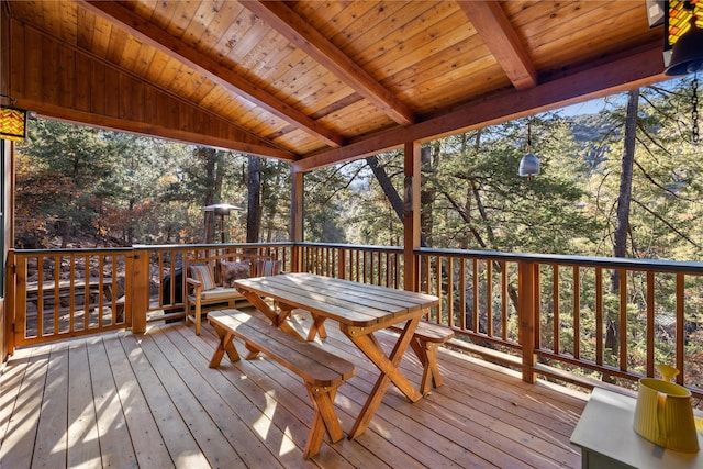 deck with outdoor dining area