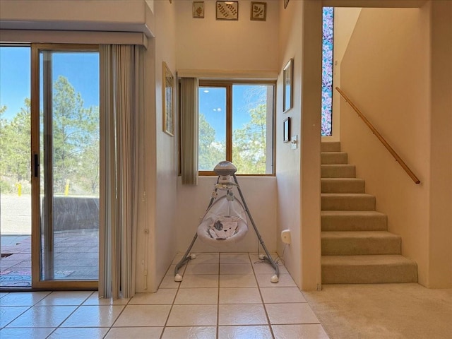 4621 Esperanza, Los Alamos, NM 87544 - interior space featuring light tile patterned flooring and stairway