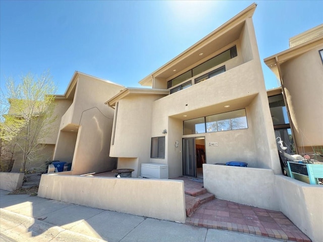 4621 Esperanza, Los Alamos, NM 87544 - view of front of house featuring stucco siding
