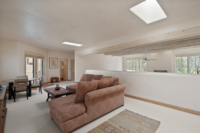 3101 Old Pecos Trl Unit 627, Santa Fe, NM 87505 - carpeted living area with a skylight