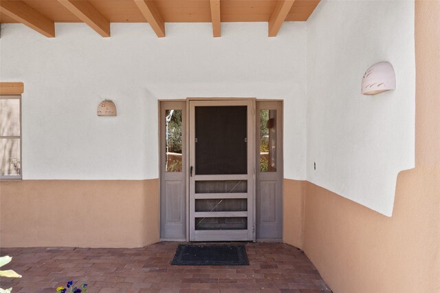 3101 Old Pecos Trl Unit 627, Santa Fe, NM 87505 - doorway to property featuring stucco siding