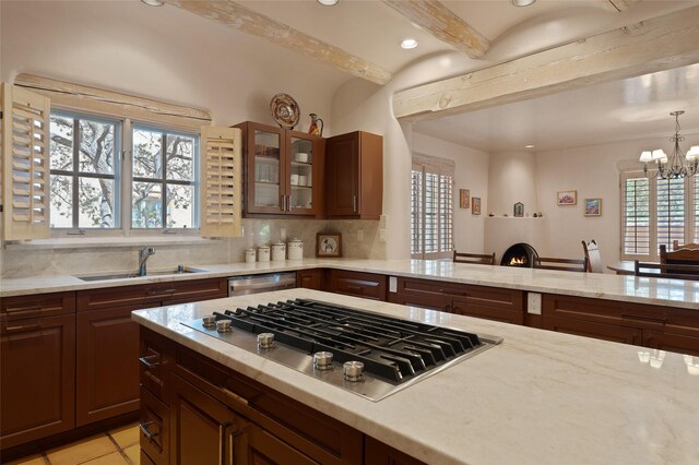 3101 Old Pecos Trl Unit 627, Santa Fe, NM 87505 - kitchen with glass insert cabinets, a wealth of natural light, stainless steel appliances, and a sink