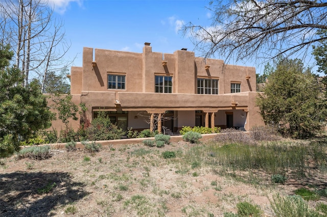 3101 Old Pecos Trl Unit 627, Santa Fe, NM 87505 - property entrance with a gate and fence