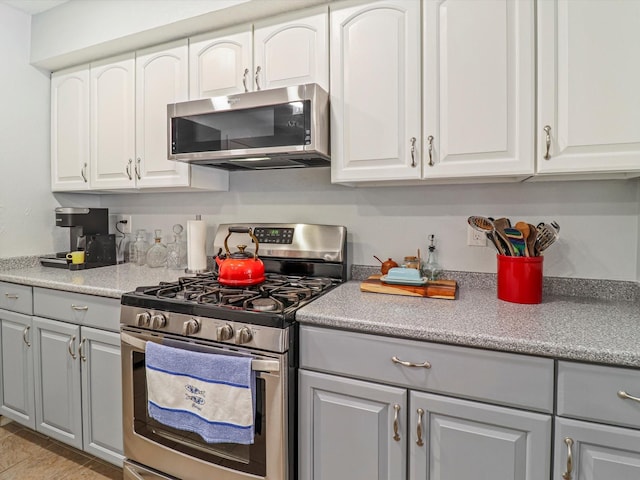 505 Oppenheimer Dr Unit 1304, Los Alamos, NM 87544 - kitchen with light countertops, gray cabinets, stainless steel appliances, and white cabinets