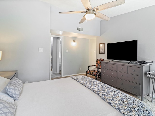 505 Oppenheimer Dr Unit 1304, Los Alamos, NM 87544 - carpeted bedroom featuring visible vents, baseboards, ceiling fan, and vaulted ceiling