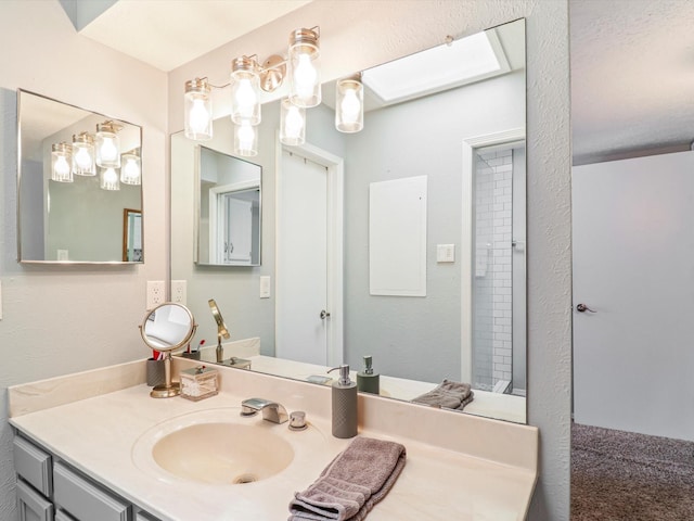 505 Oppenheimer Dr Unit 1304, Los Alamos, NM 87544 - bathroom with vanity and a skylight