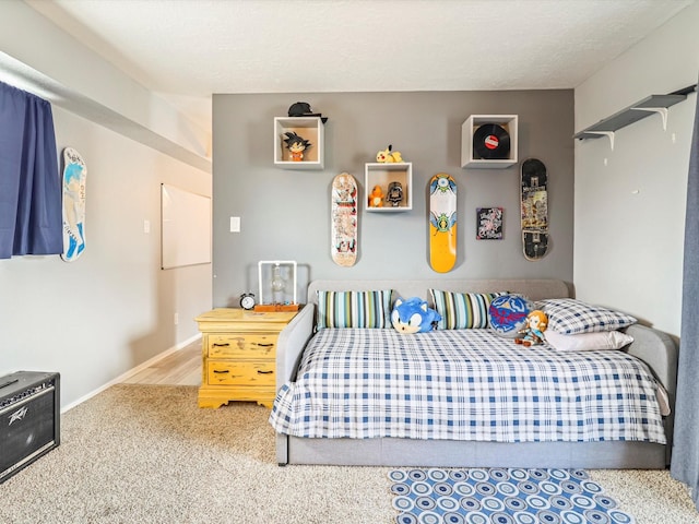 505 Oppenheimer Dr Unit 1304, Los Alamos, NM 87544 - carpeted bedroom featuring baseboards