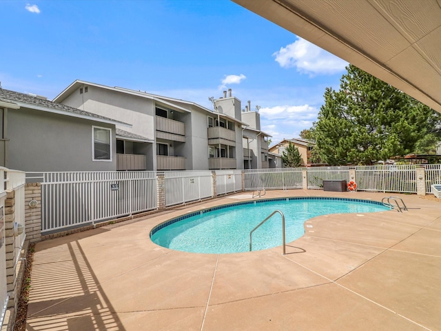 505 Oppenheimer Dr Unit 1304, Los Alamos, NM 87544 - pool featuring a patio and fence