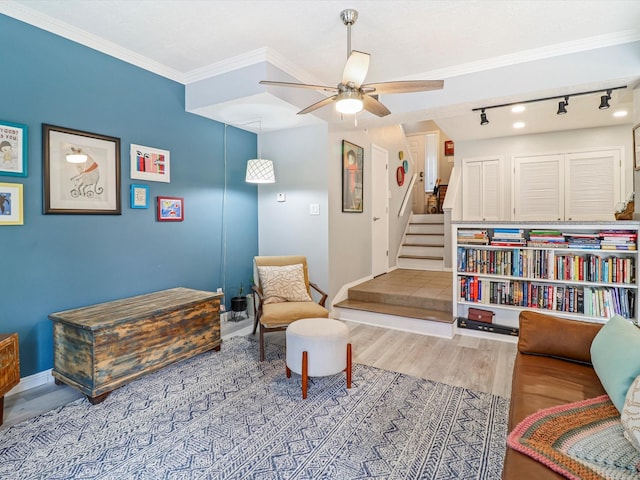 505 Oppenheimer Dr Unit 1304, Los Alamos, NM 87544 - sitting room featuring ceiling fan, rail lighting, wood finished floors, baseboards, and stairs