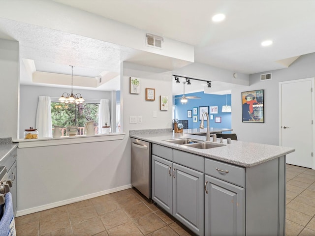 505 Oppenheimer Dr Unit 1304, Los Alamos, NM 87544 - kitchen with stainless steel dishwasher, visible vents, a peninsula, gray cabinets, and a sink