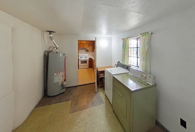 laundry room featuring washer and dryer, laundry area, and gas water heater