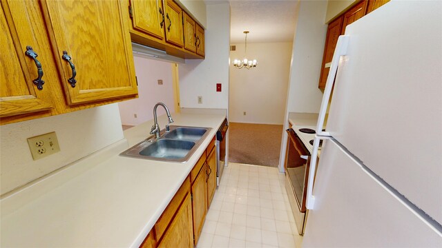 kitchen featuring light carpet, a sink, white appliances, light countertops, and pendant lighting