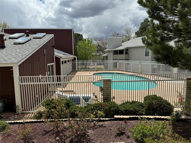 pool featuring fence