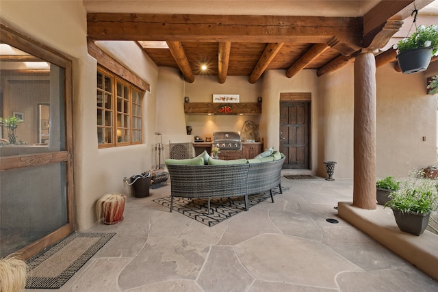 35 Sage Cir, Santa Fe, NM 87506 - view of patio / terrace featuring grilling area and an outdoor kitchen