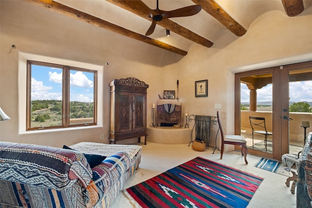 35 Sage Cir, Santa Fe, NM 87506 - carpeted bedroom with a ceiling fan, french doors, access to exterior, beam ceiling, and high vaulted ceiling