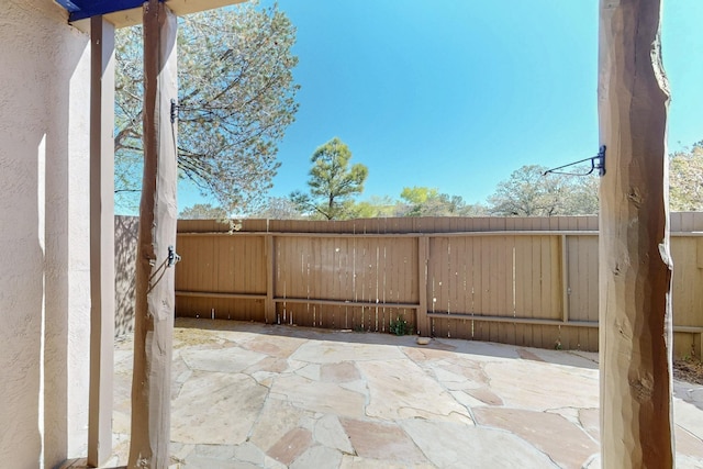 view of patio with fence