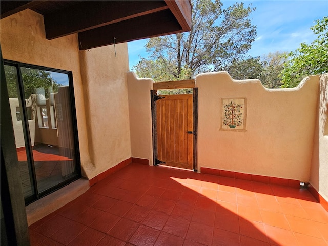 view of patio / terrace featuring a gate