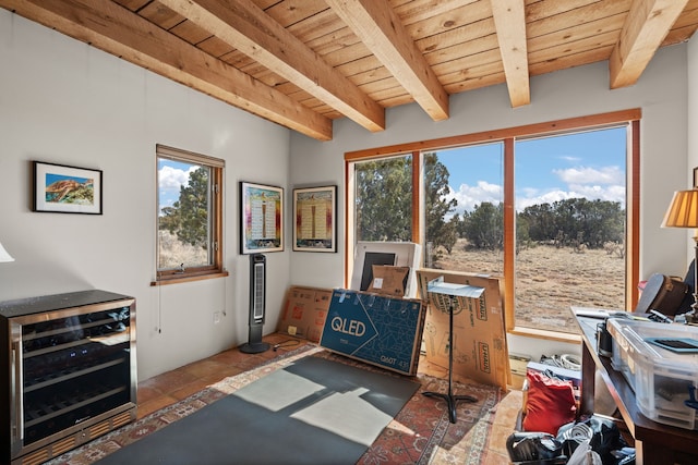 misc room featuring plenty of natural light, wine cooler, wooden ceiling, and beamed ceiling