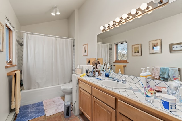 bathroom featuring toilet, shower / bath combo, lofted ceiling, and vanity