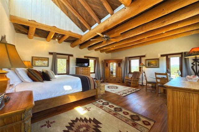 bedroom featuring beamed ceiling and dark wood-style flooring