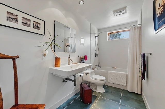 bathroom with toilet, tile patterned floors, shower / bath combination with curtain, baseboards, and visible vents
