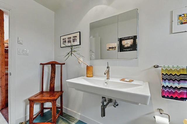 bathroom featuring baseboards