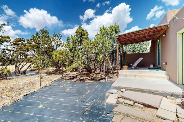 view of patio featuring a deck