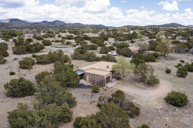 drone / aerial view with a mountain view and a desert view