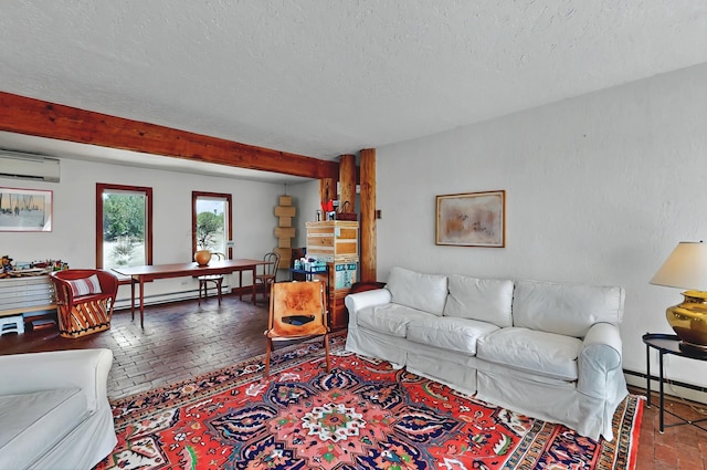 living room featuring an AC wall unit, a textured ceiling, brick floor, and a baseboard heating unit