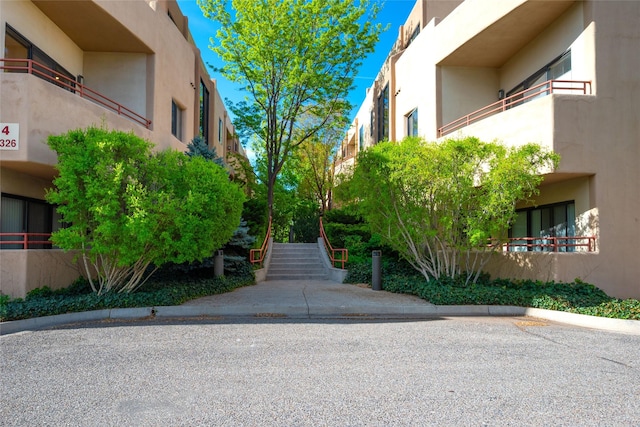 view of home's community with stairs