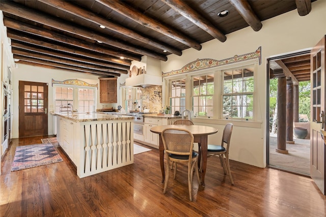 dining space featuring wood ceiling, beam ceiling, and dark wood-style floors
