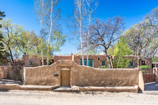 exterior space with a fenced front yard