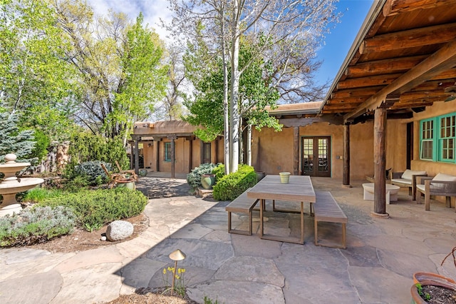 view of patio / terrace with french doors and outdoor dining space