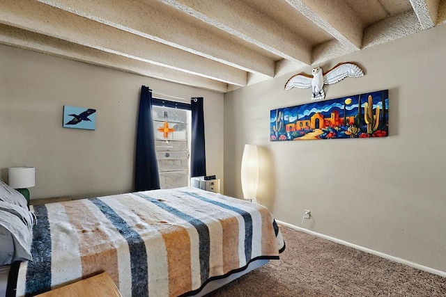 bedroom featuring baseboards and carpet