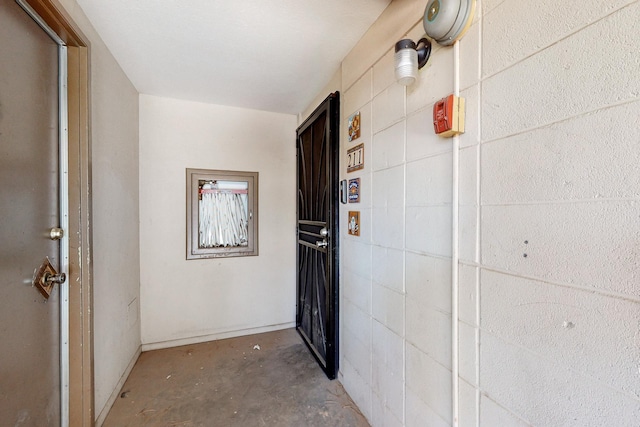 hallway featuring concrete floors