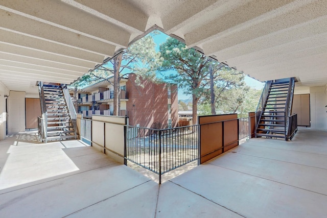 view of patio featuring stairs