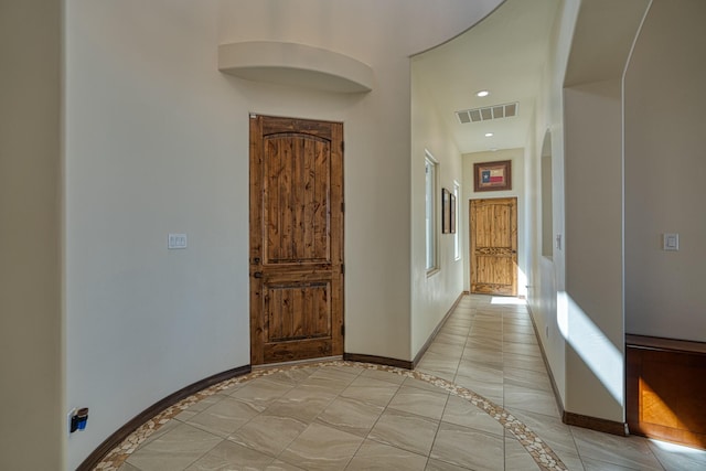 3415 Ramadan Ct NE, Rio Rancho, NM 87144 - corridor featuring baseboards, visible vents, and light tile patterned floors