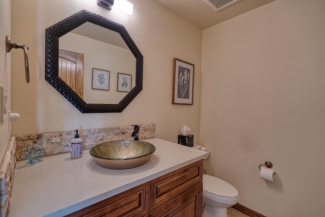 3415 Ramadan Ct NE, Rio Rancho, NM 87144 - half bath with toilet, visible vents, and vanity