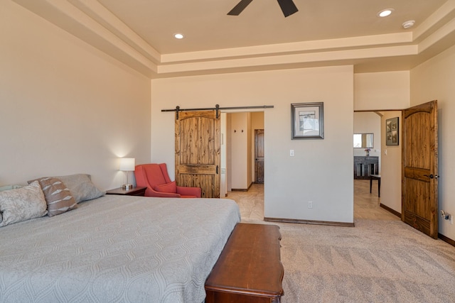 3415 Ramadan Ct NE, Rio Rancho, NM 87144 - bedroom featuring recessed lighting, baseboards, a barn door, and a raised ceiling
