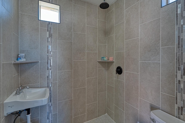 3415 Ramadan Ct NE, Rio Rancho, NM 87144 - full bathroom with toilet, a sink, a tile shower, and a healthy amount of sunlight
